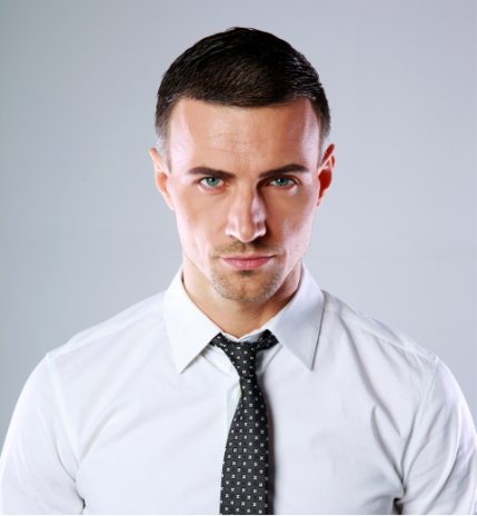 portrait-of-a-confident-man-over-gray-background-PDL3Q9F